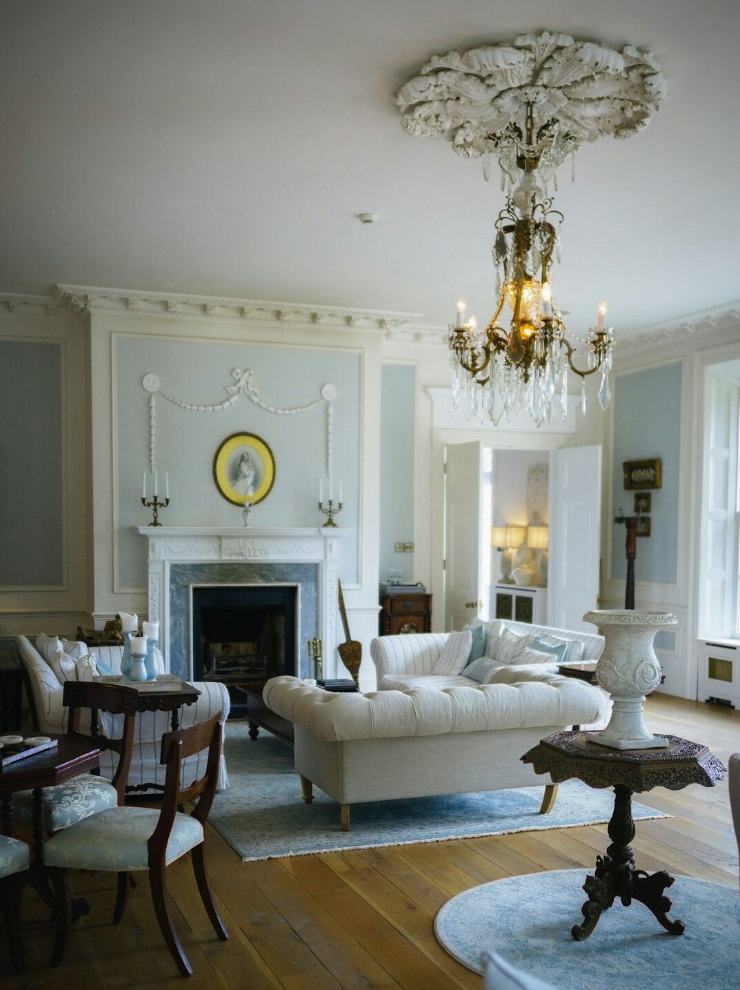 Elegant living room with vintage furniture and warm lighting