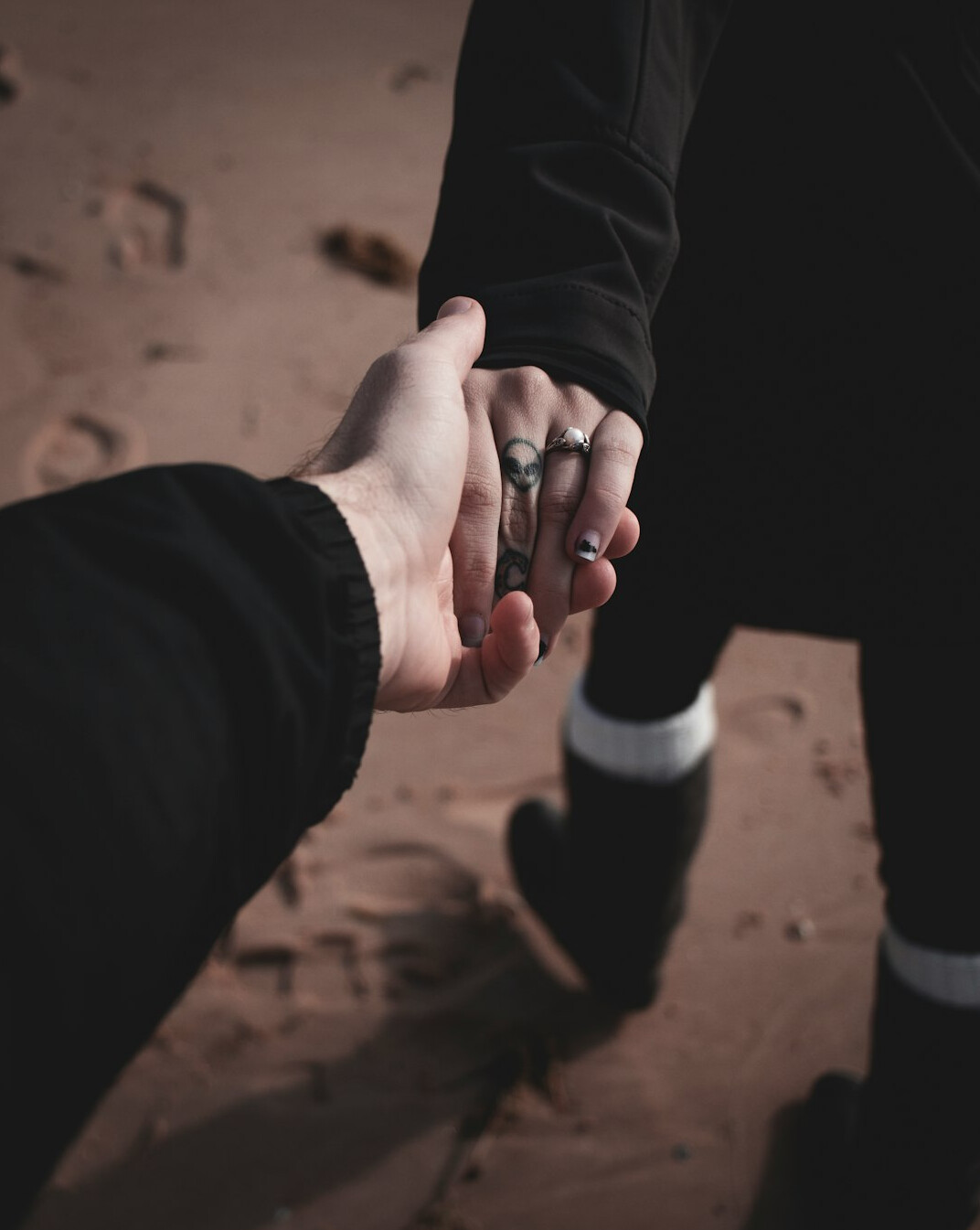 Two business partners shaking hands in an office